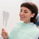 Dental Fillings | Dental patient looking at mirror
