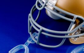 sports dentistry | mouthguard and football helmet