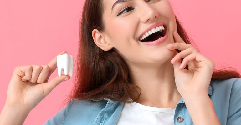 woman smiling | cosmetic dental procedures