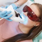 in-office teeth whitening | dentist and patient