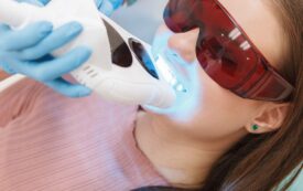 in-office teeth whitening | dentist and patient